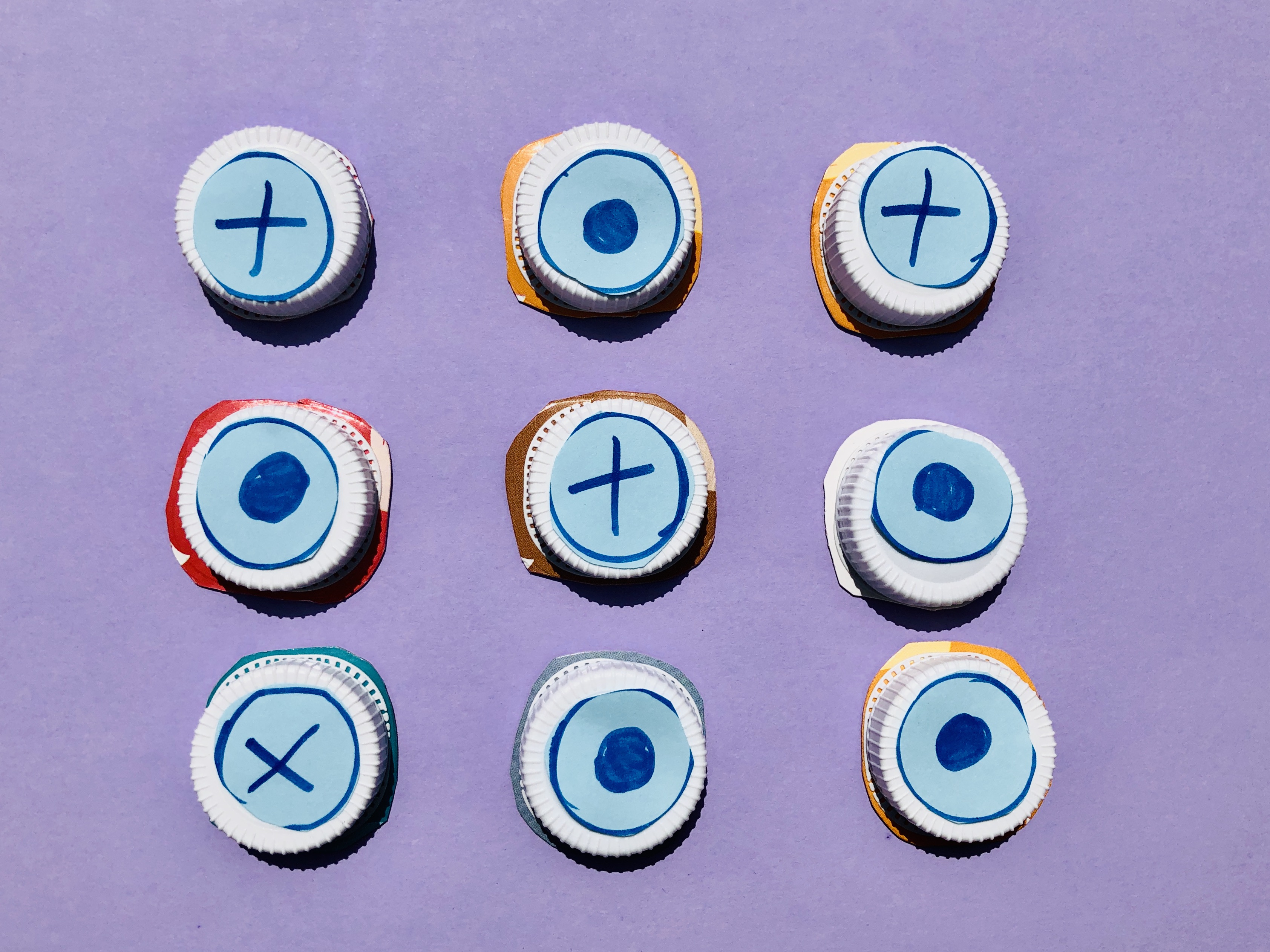 Noughts and crosses made with milk lids, upcycling