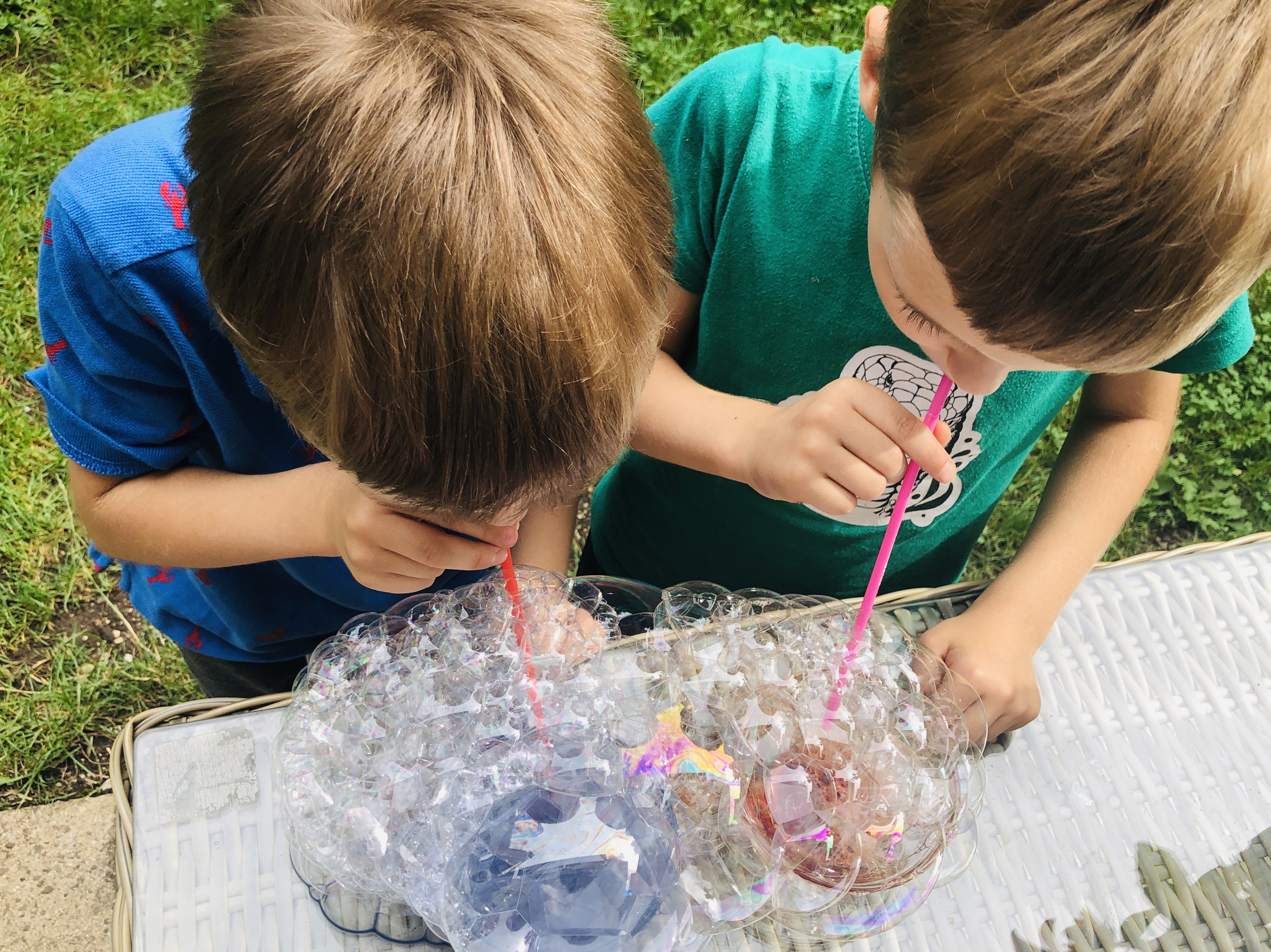 blowing bubbles with straws