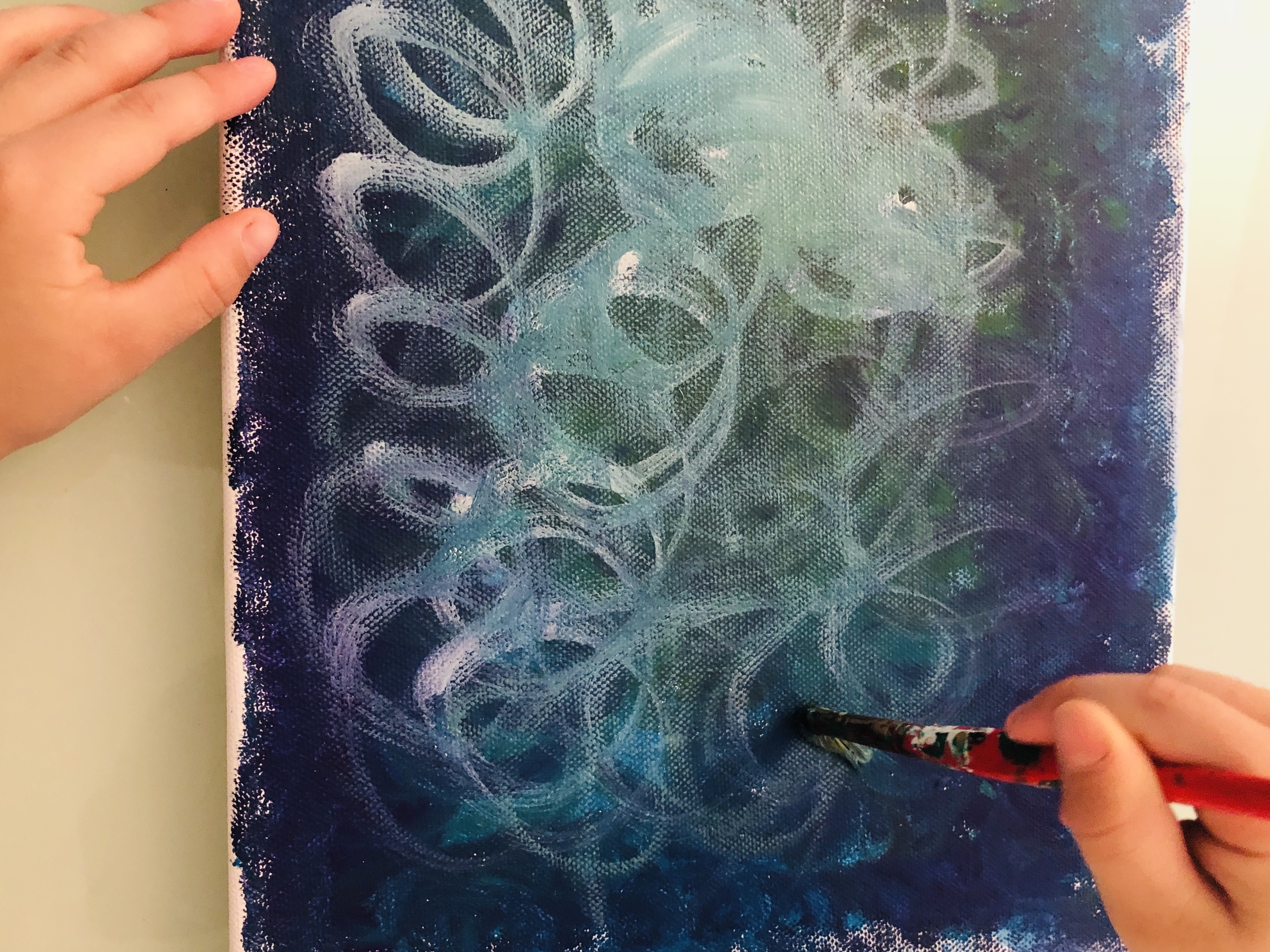 painting the canvas for spider art