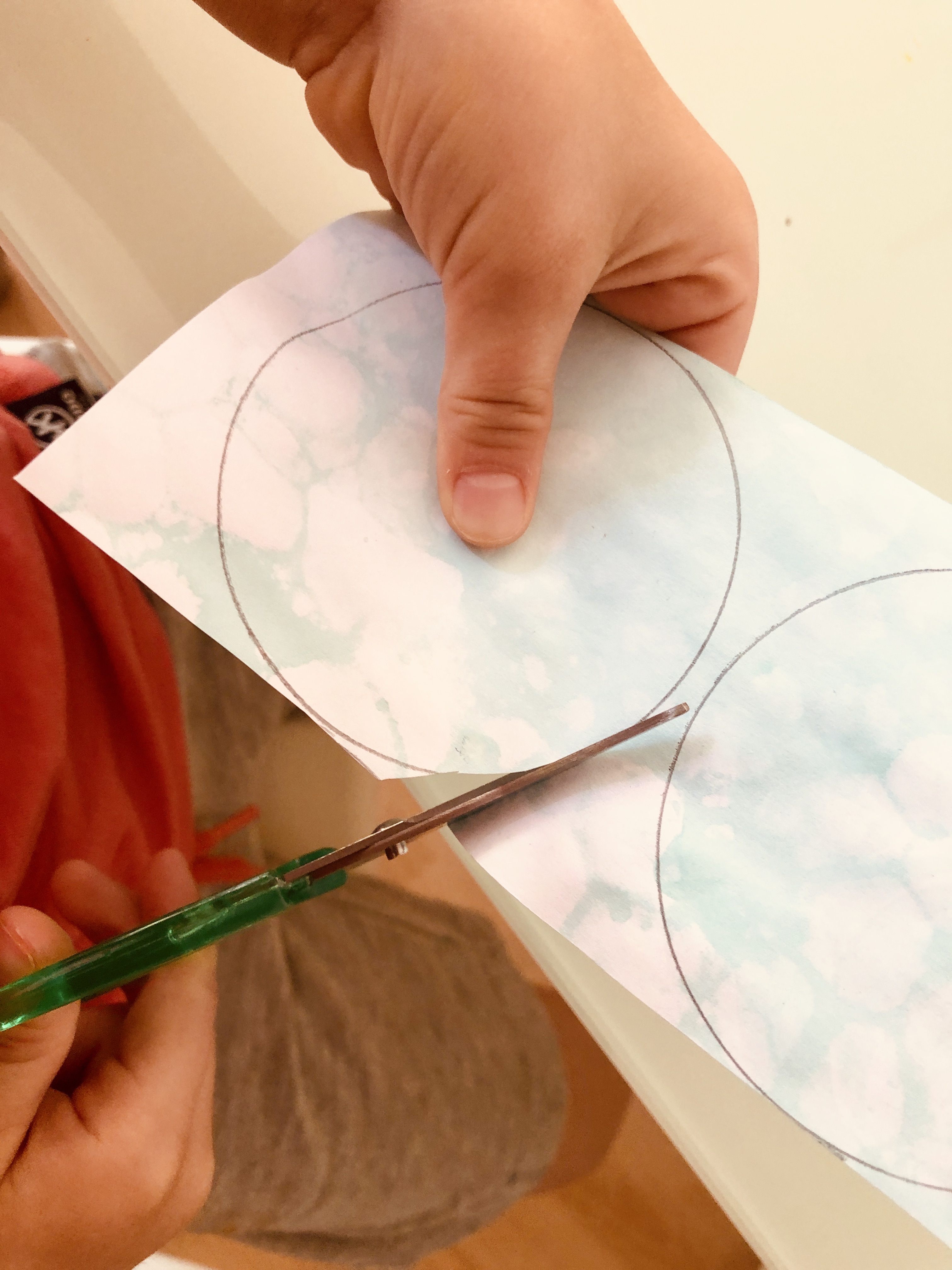cutting out circles for bubble paintings